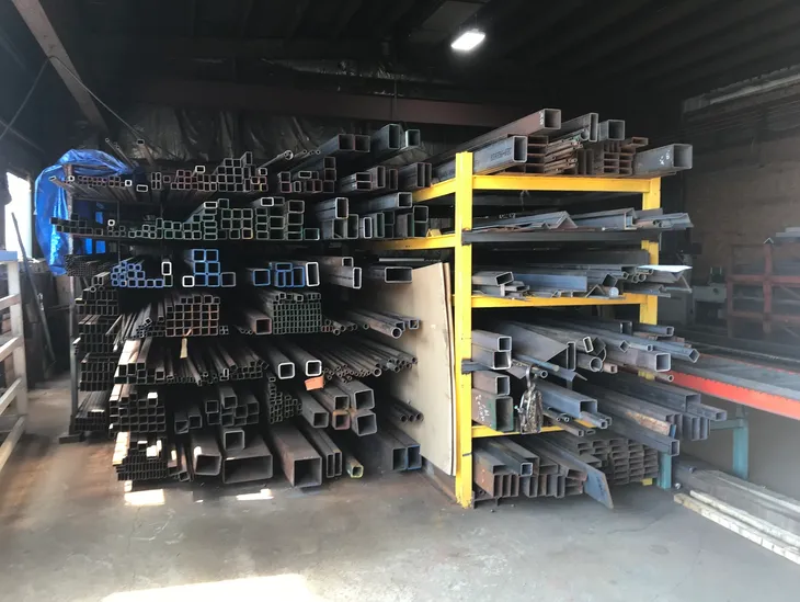 Assorted metal tubing on shelves